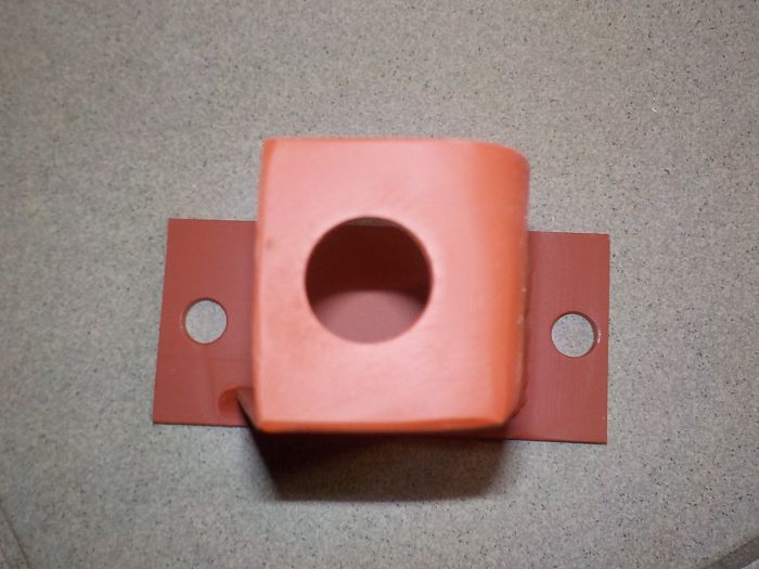 Pravý držák předního světlometu