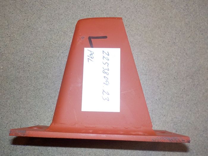 Levý držák předního světlometu