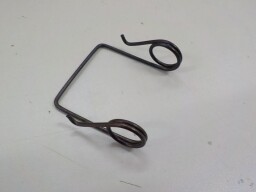 Napínací pružina spojky slabší