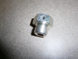 Odvzušňovací zátka víka řízení