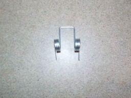 Pružina západky zadního okna kabiny