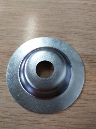 Zarážka zubové spojky uzávěrky