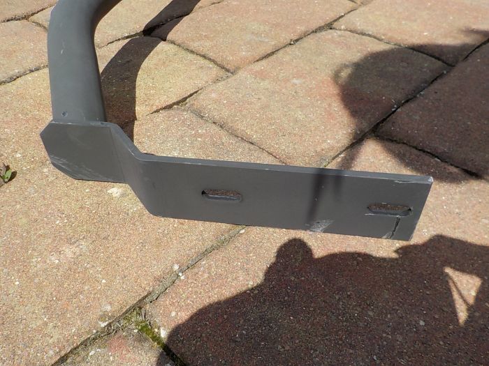 Držák blatníku horní levý