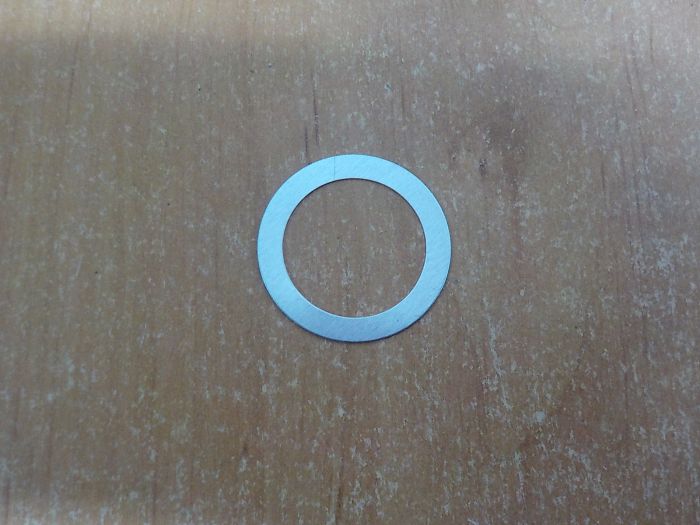 Podložka pod pouzdro vstřikovače